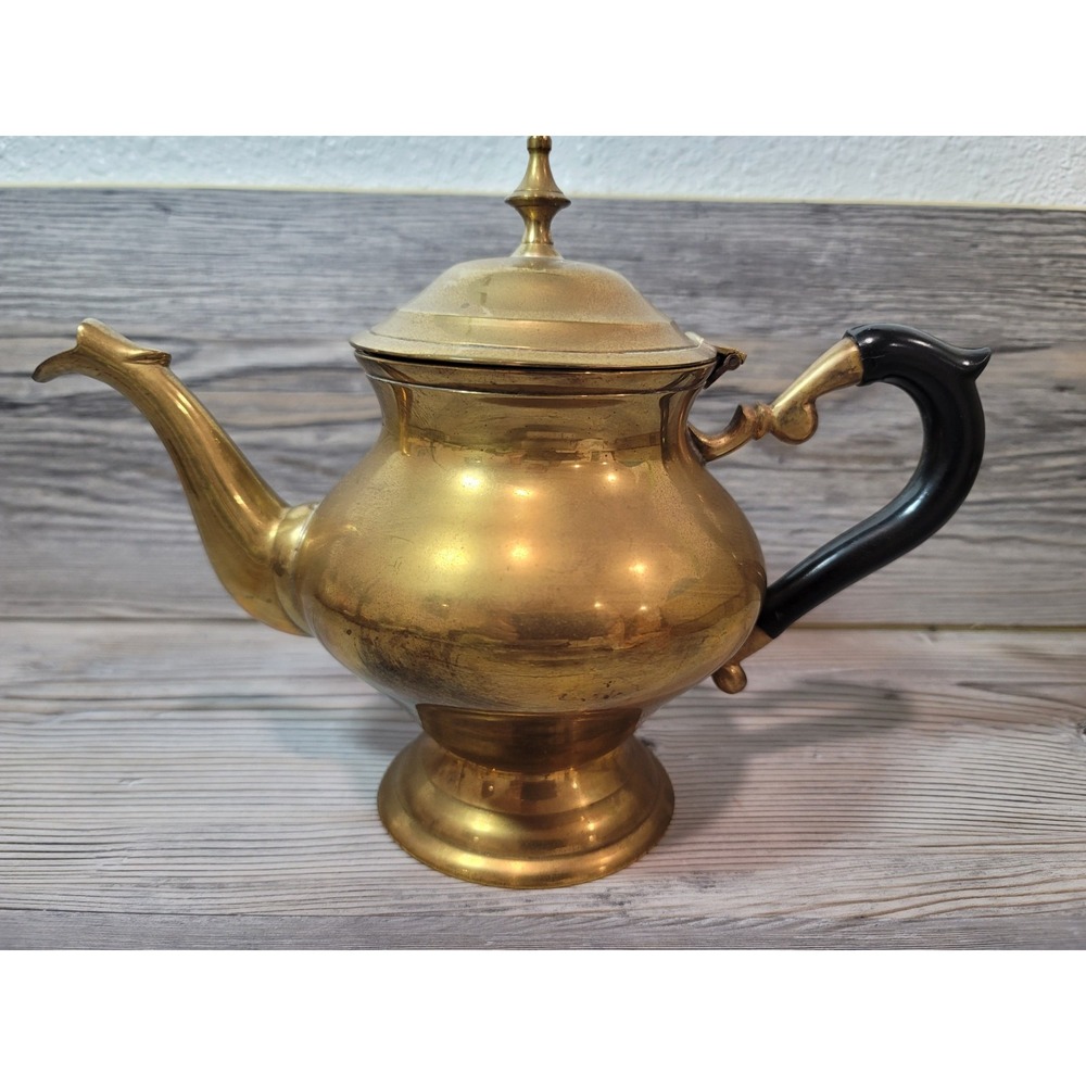 Brass teapot Vintage from India with plastic covers handle 7in tall 10.5in wide